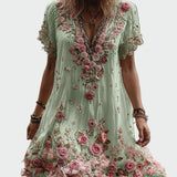 Vintažo stiliaus suknelė su trumpomis rankovėmis ir elegantišku gėlių siuvinėjimu