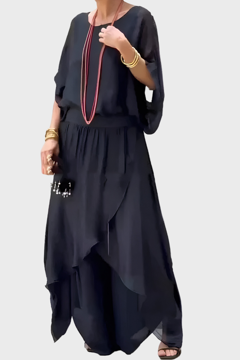 Plačios viršutinės dalies ir suplėšytos kelnės – dviejų dalių sijonas iš šifono