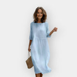 Suknelė su Pabrėžiančiu Dizainu Pilvui