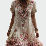 Vintažo stiliaus suknelė su trumpomis rankovėmis ir elegantišku gėlių siuvinėjimu