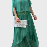 Plačios viršutinės dalies ir suplėšytos kelnės – dviejų dalių sijonas iš šifono