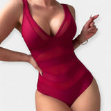 Visas maudymosi kostiumėlis su permatomomis detalėmis