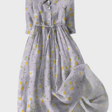 Puošnus suknele su ramunėmis