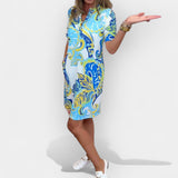 Vasaros suknelė su gyvybingais raštais